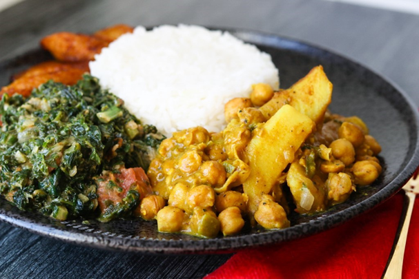 Caribbean Curried Chickpeas with Potatoes and Sautéed Spinach & Kale